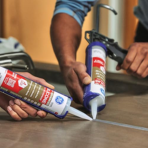 Clear silicone sealant texture on white surface