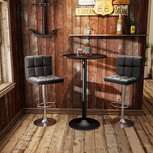 Set of two black bar stools in a kitchen setting