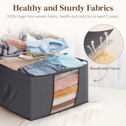 Reinforced fabric handles on storage bin