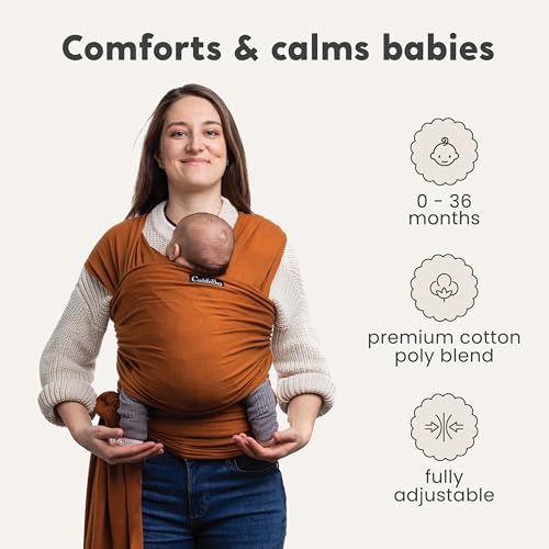 Parent wearing CuddleBug wrap with newborn