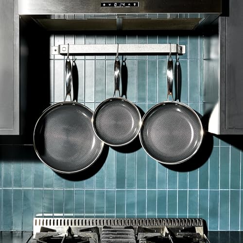 Three HexClad frying pans with glass lids