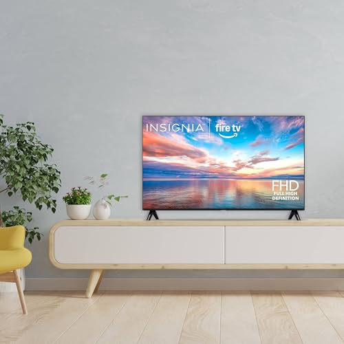 INSIGNIA 32-inch TV mounted in living room