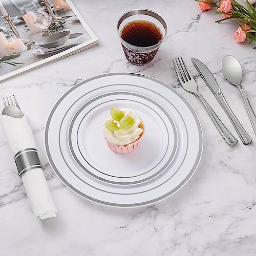 Close up of Goodluck plastic cutlery and silver rimmed cups
