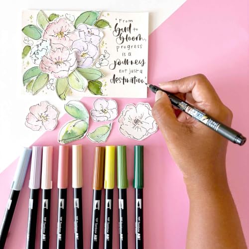 Tombow Fudenosuke pens held in hand