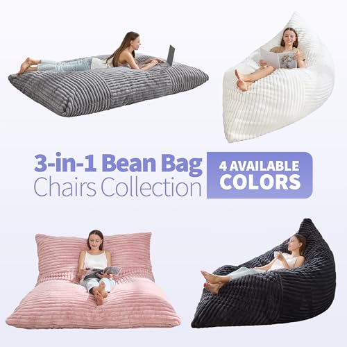 Adult lounging on large dark grey bean bag