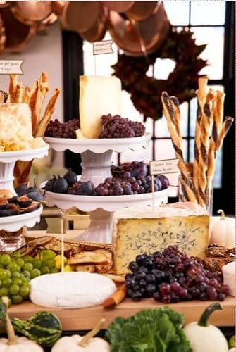 Martha Stewart Patterson stand holding a round cake