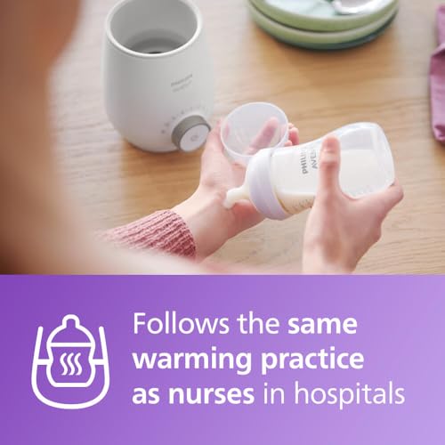 White bottle warmer heating a baby bottle