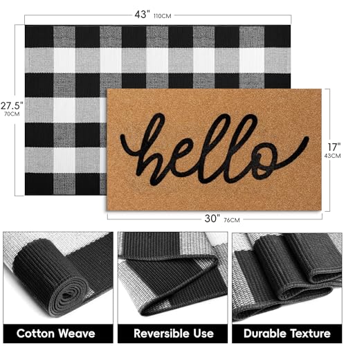 Hello coir mat layered on buffalo plaid rug