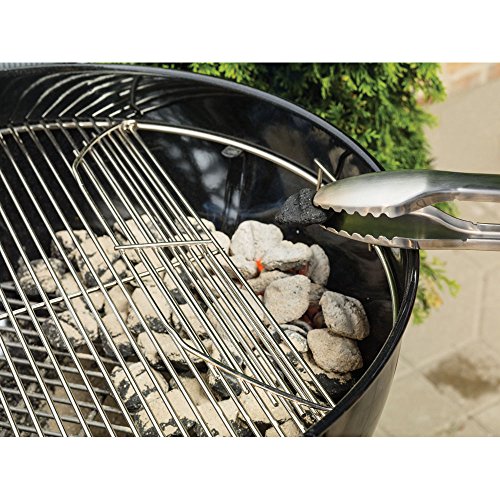 Side profile view of black 22-inch Weber grill