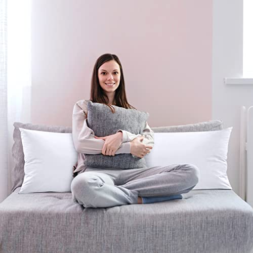 Full length view of white body pillow