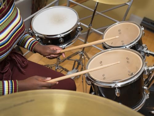 Polished maple wood surface of Mdvora 5A drum sticks