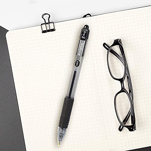 Zebra Pen writing on notebook paper