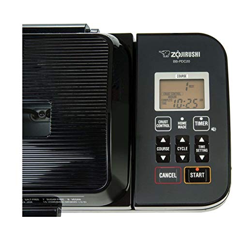 Open Zojirushi breadmaker showing the inner pan