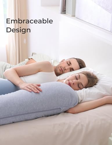 Person using Momcozy pillow on couch