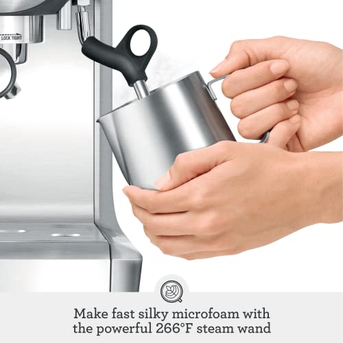 Breville espresso machine brewing an extraction