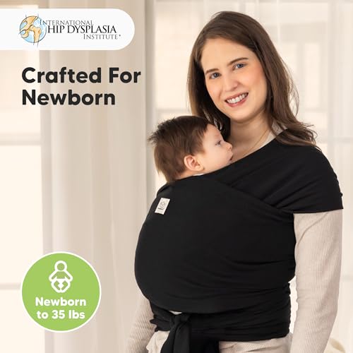 Parent wearing baby in KeaBabies Wrap