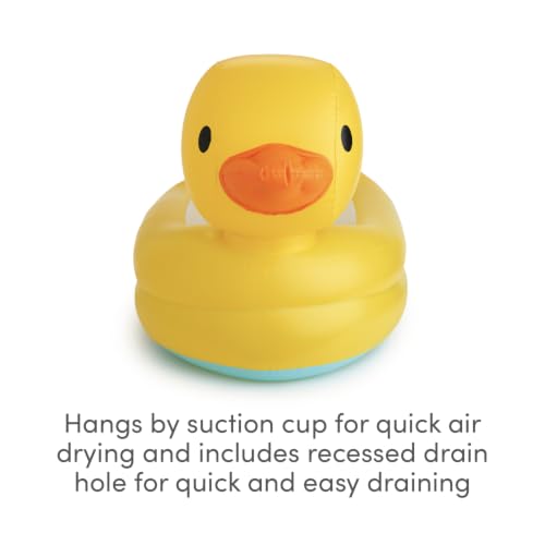 Baby sitting in Munchkin duck bathtub