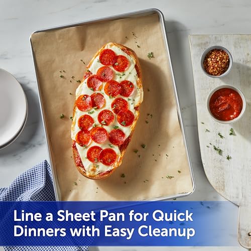 Parchment paper lining a baking sheet