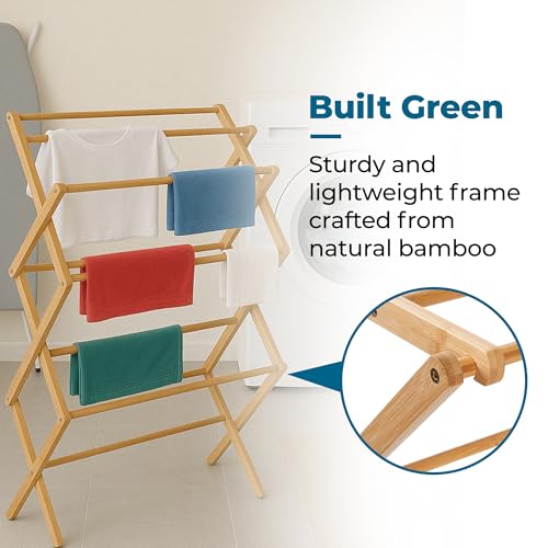 Honey-Can-Do drying rack holding towels and clothes