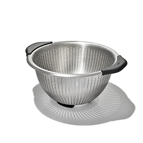 OXO colander being used to drain pasta