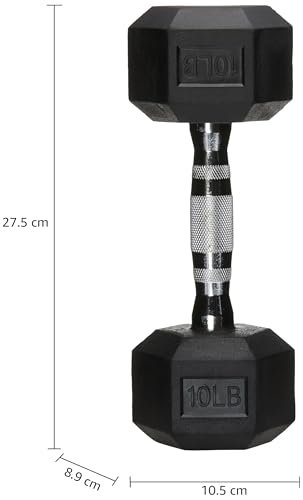 Dumbbell resting on a gym mat