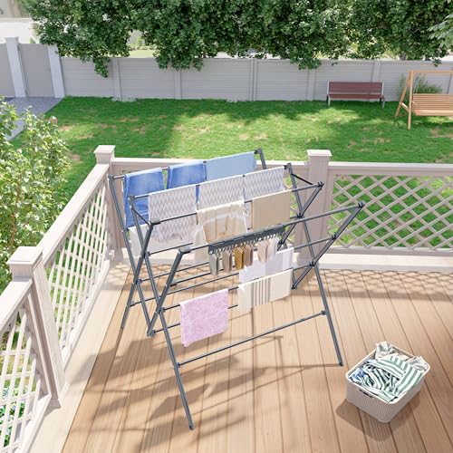 Clothes drying rack holding various garments