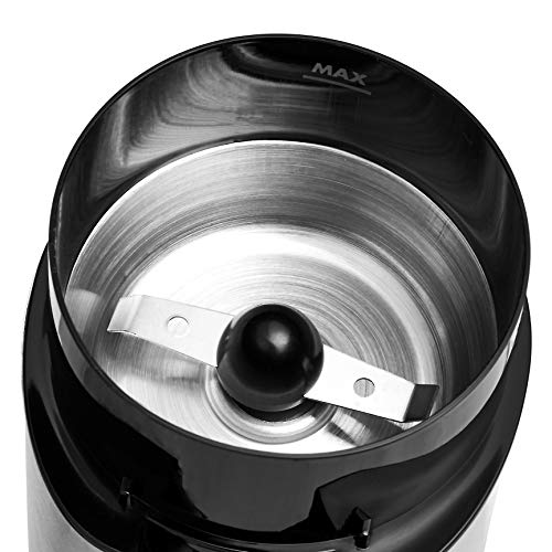 Grinder lid removed showing stainless steel chamber