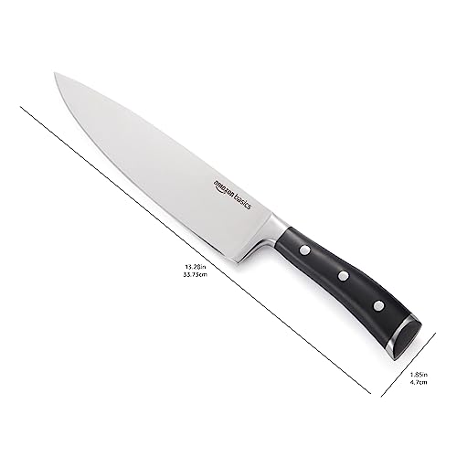 Chef knife resting on kitchen surface