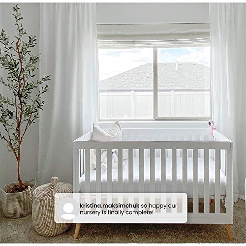 Solid pine leg detail on white crib