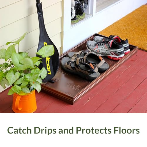 Boot tray used as a decorative plant stand