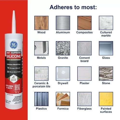 White silicone caulk bead on tile surface