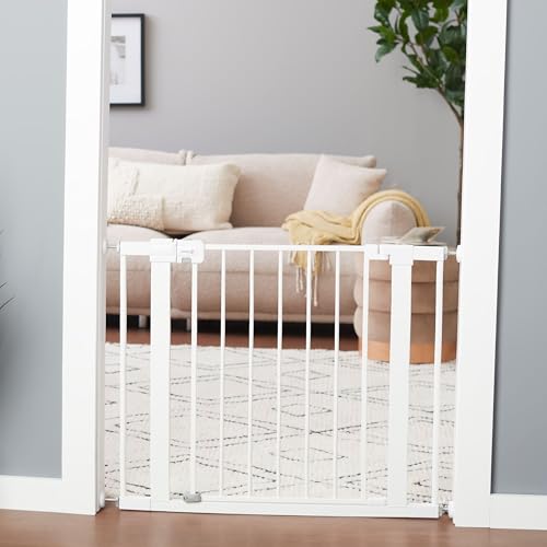 Safety 1st white pet gate installed in doorway