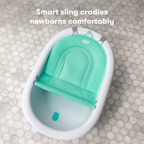 Frida Baby 4-in-1 tub showing newborn sling setup