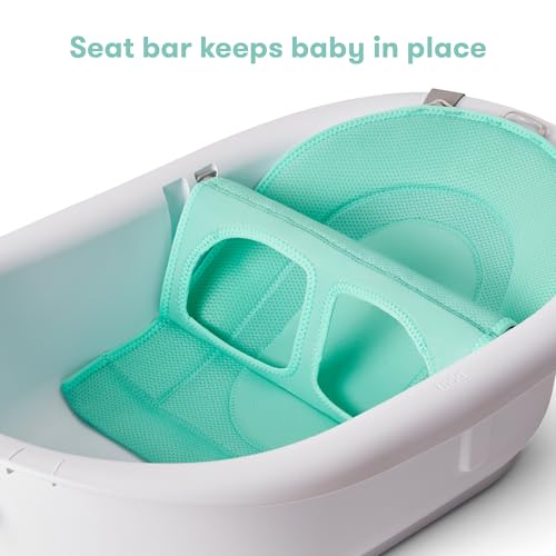 Toddler using Frida Baby 4-in-1 Grow-with-Me Bathtub