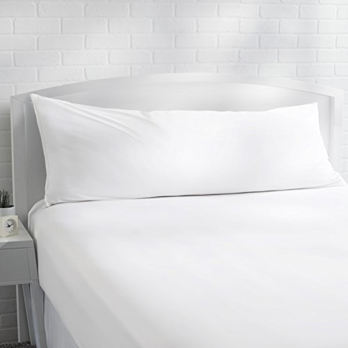 White body pillow cover on bed