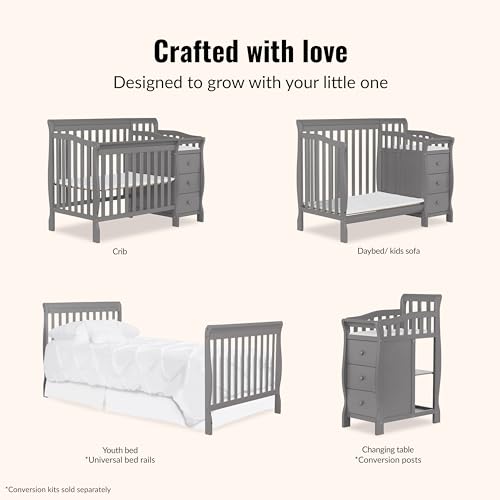 Close up of crib safety slats and grey finish