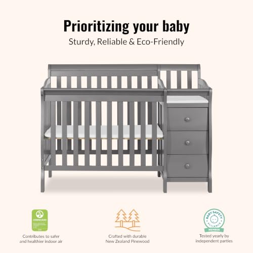 Integrated changing table with safety pad