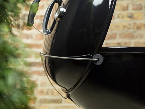 View of the Tuck-Away lid holder in use