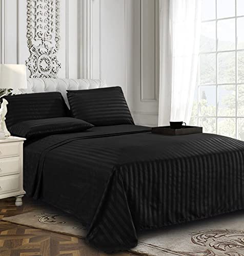 Flat sheet spread out on bed
