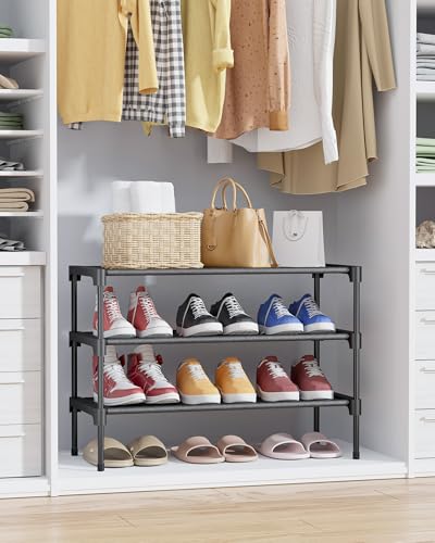 Shoe rack positioned in a walk-in closet