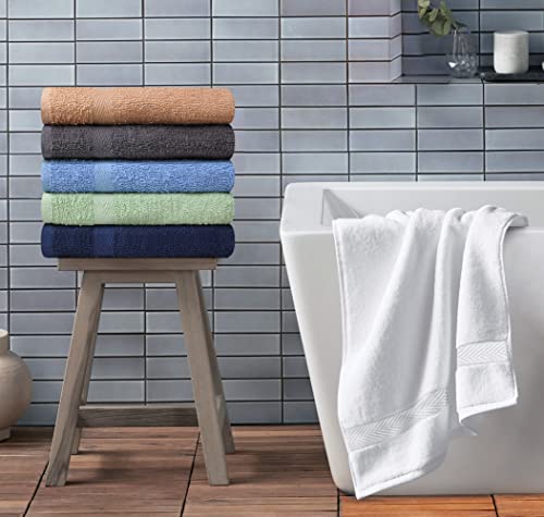 Stack of T & L 27x54 towels in assorted colors