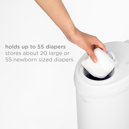 Ubbi Stainless Steel Diaper Pail in a nursery setting