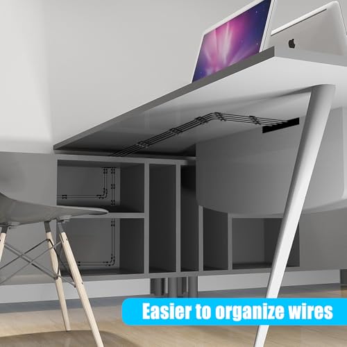 Adhesive cable clip mounted on a vertical wall surface