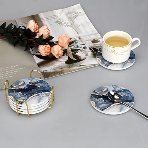 Blue coasters on coffee table setting