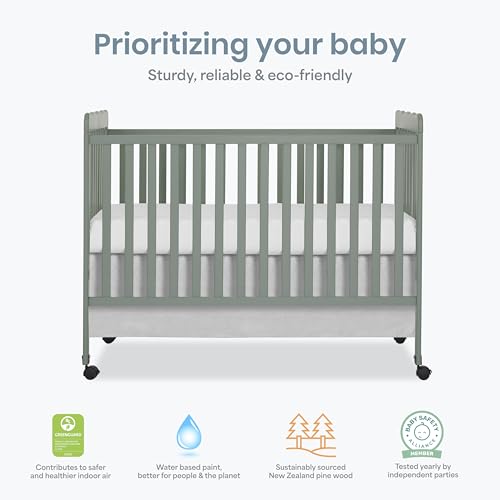 View of teething guards on Dream On Me Carson crib rails