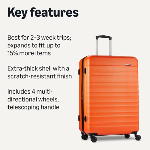 Basics orange suitcase four spinner wheels view