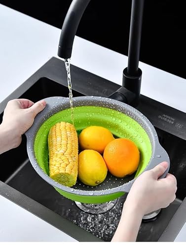 Emptycolor colander draining pasta in sink