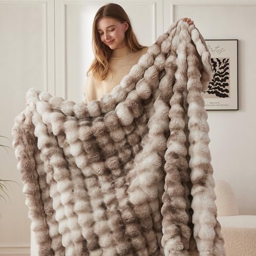 COOVA blanket draped over a living room chair