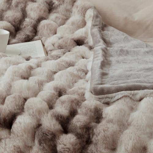 Blanket displayed in a bedroom setting