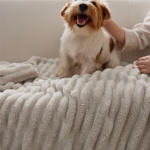 Lightweight fleece blanket folded on a chair
